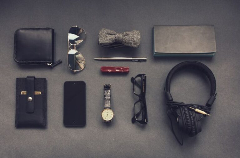 Accessories - black corded headphones near eyeglasses