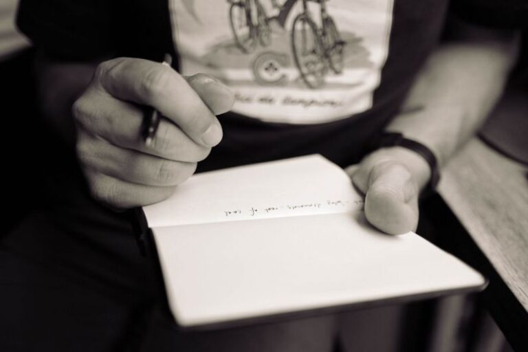 Tasting Notes - person writing on notepad
