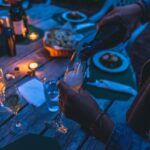 Tasting Event - person putting wine on flute glass