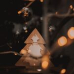 Emerging Trends - a wooden christmas tree with lights around it