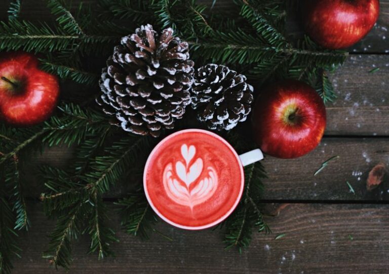 Sustainable Coffee - red coffee latte on white ceramic mug