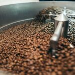 Roasts - coffee beans on grinde r