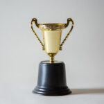 Competitions - yellow and white trophy