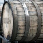 Siphon Brewing - beige wooden barrel on black crate