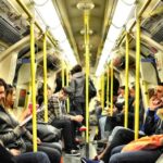 Urban Life - photo of group on people sitting inside train