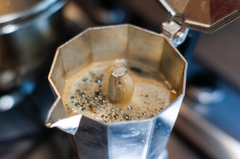 Moka Pot - coffee in silver cup with coffee