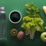 Health Benefits - assorted fruits and vegetables on green surface