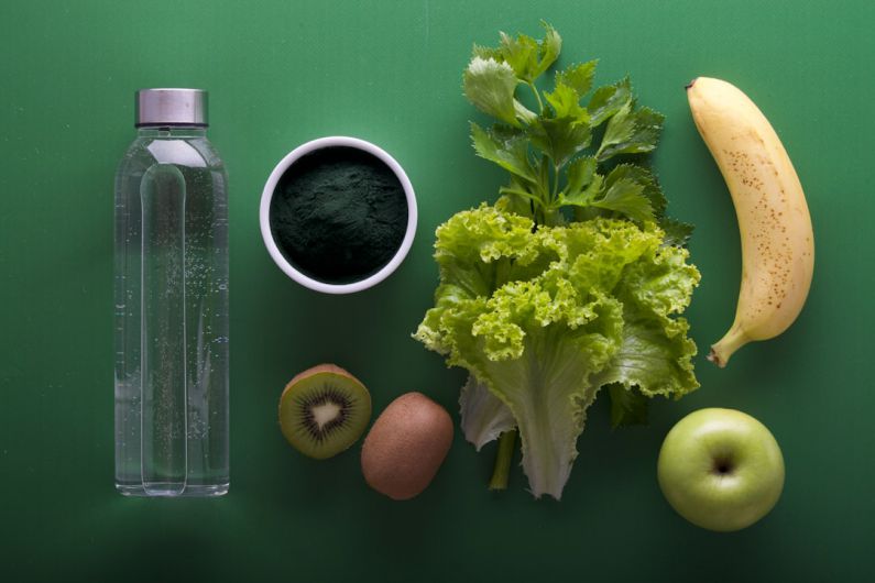 Health Benefits - assorted fruits and vegetables on green surface