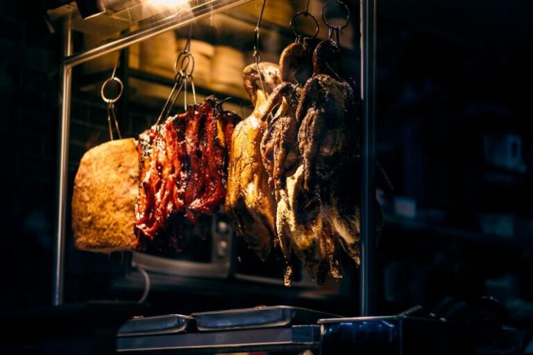 Roasting Timeline - a bunch of meat hanging from a rack