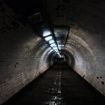 Consistency - gray concrete tunnel