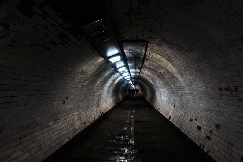 Consistency - gray concrete tunnel